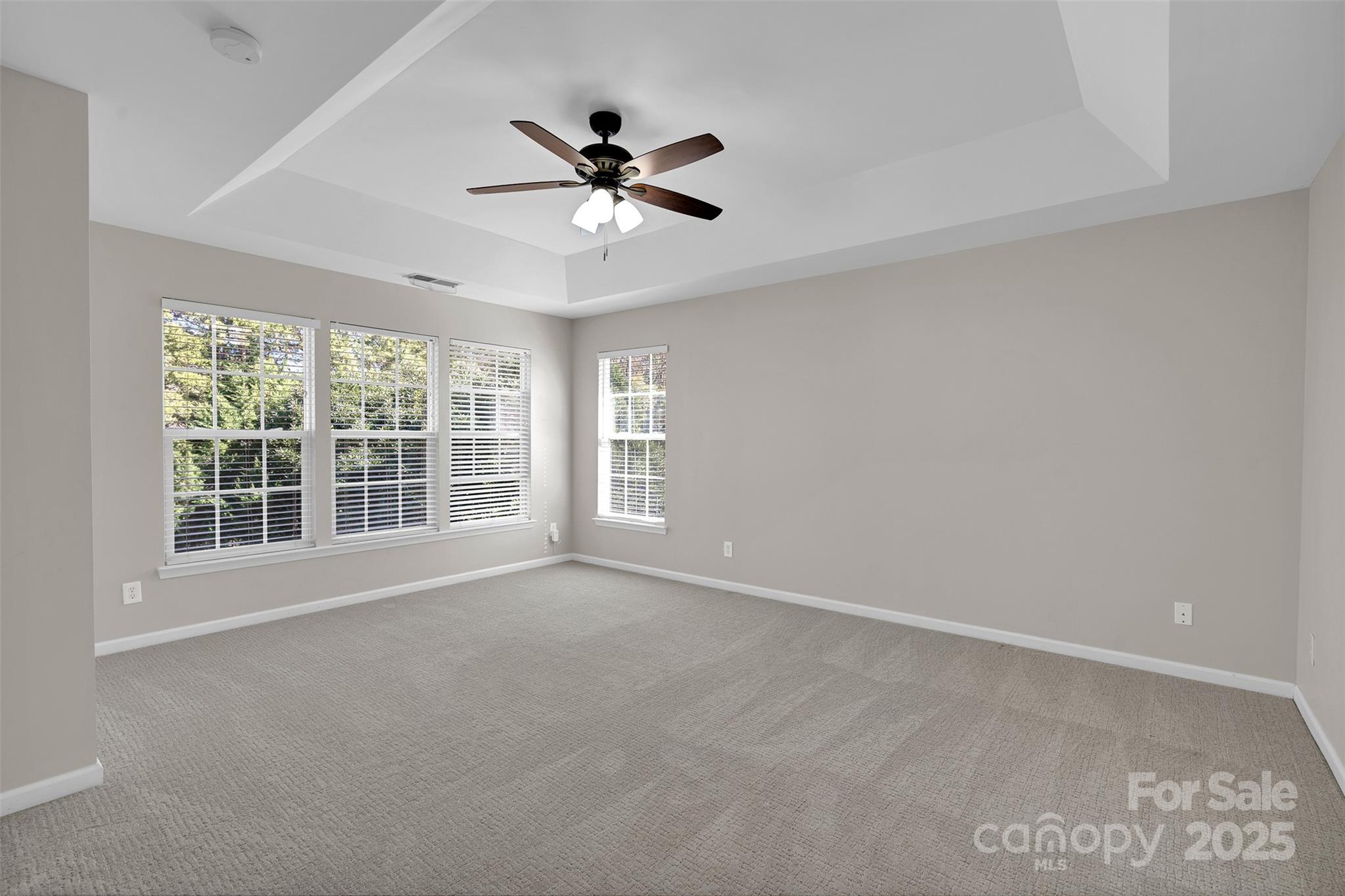 9211 Hickory Tree Lane Charlotte, NC 28277 - Photo 28 of 46 a view of an empty room with a window