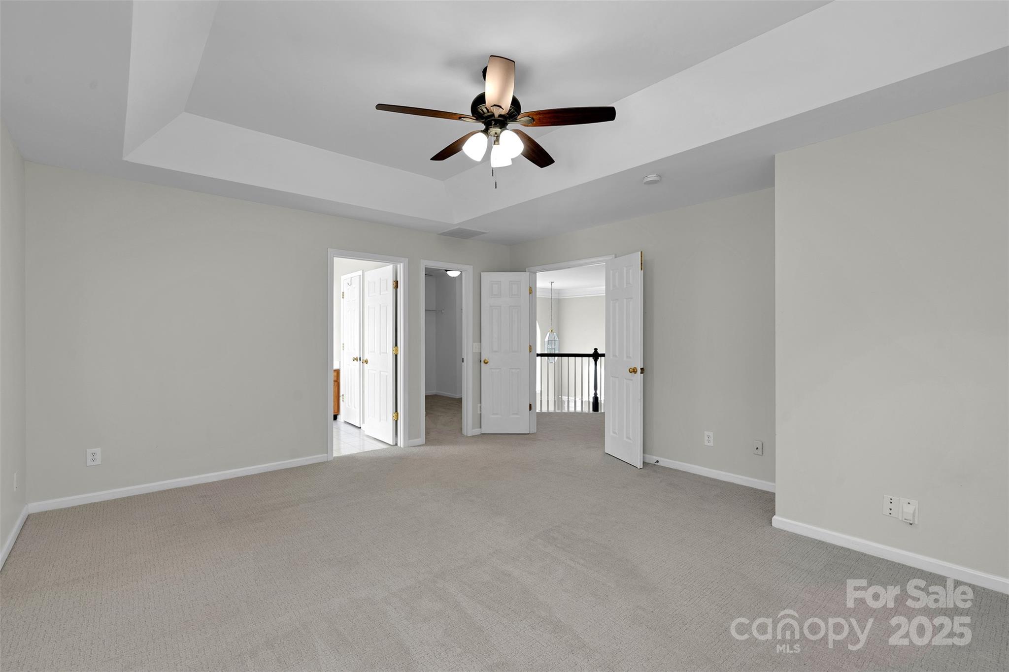 9211 Hickory Tree Lane Charlotte, NC 28277 - Photo 29 of 46 a view of an empty room and chandelier fan