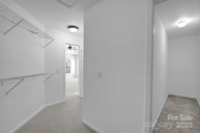 a view of an empty walk in closet