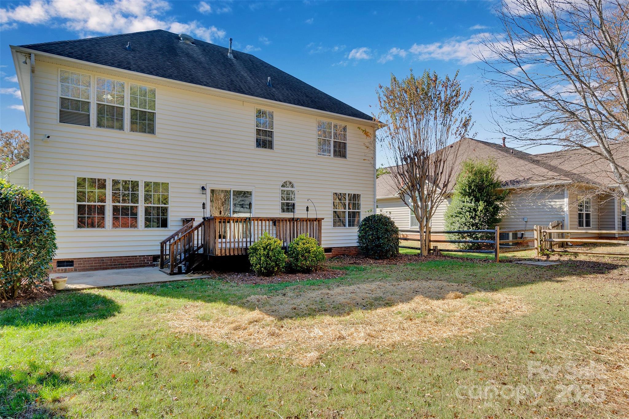 9211 Hickory Tree Lane Charlotte, NC 28277 - Photo 43 of 46 a view of a house with a yard and plants