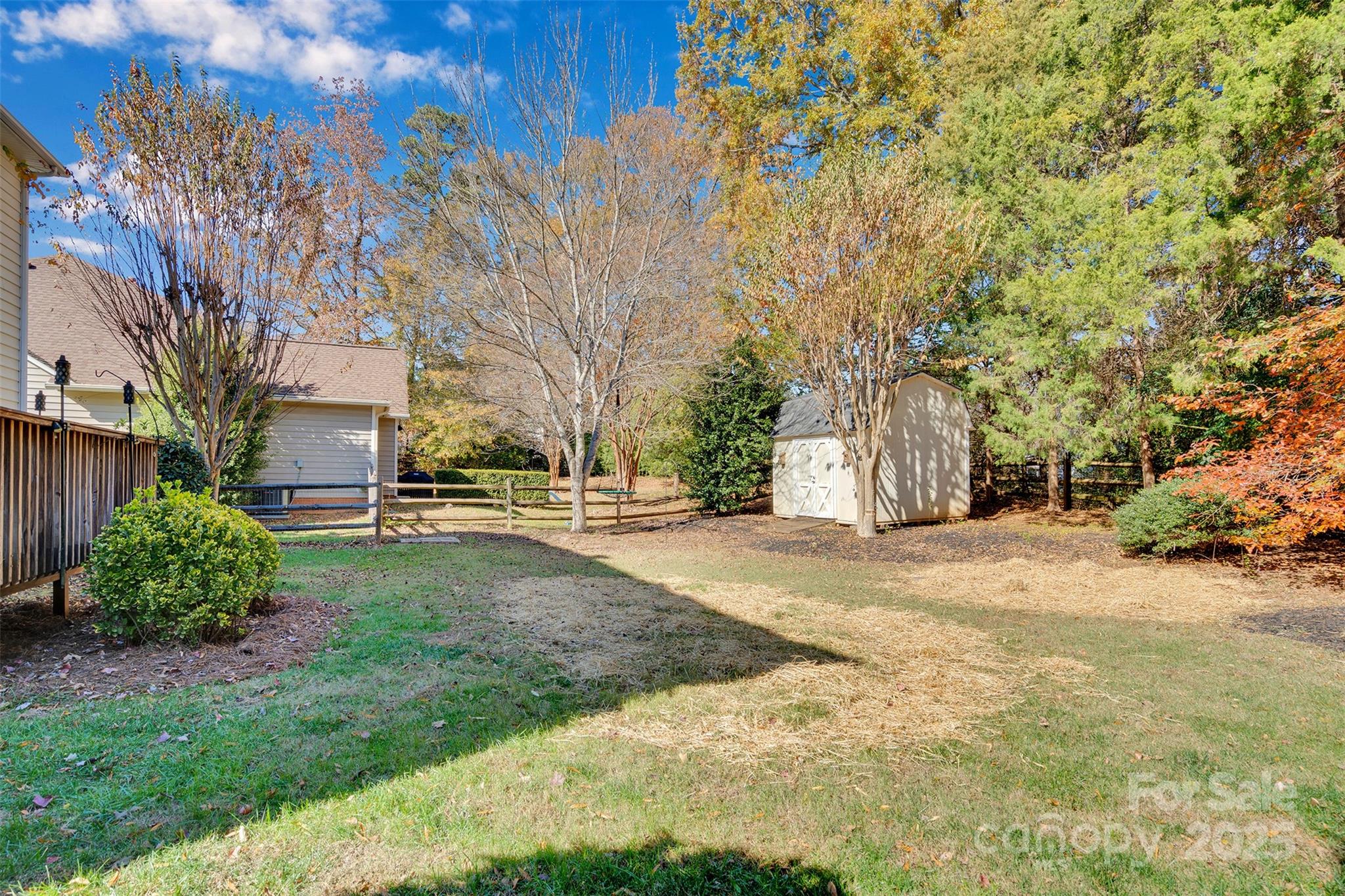 9211 Hickory Tree Lane Charlotte, NC 28277 - Photo 45 of 46 a view of a yard with plants and trees