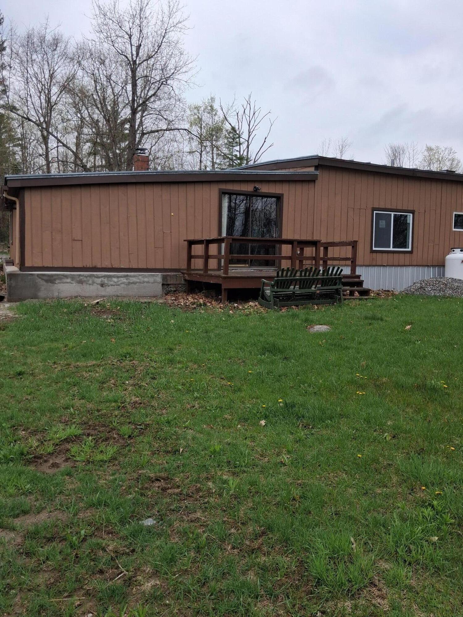 308 Whittier Road Farmington, ME 04938 - Photo 3 of 30 Deck & Backyard