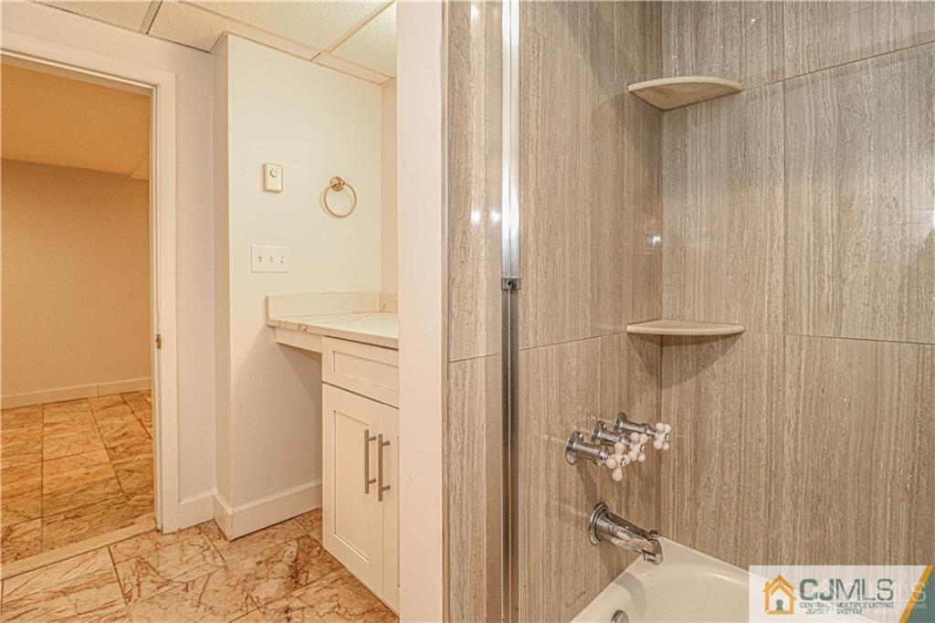578 Chain O' Hills Road Colonia, NJ 07067 - Photo 26 of 39 a bathroom with a shower