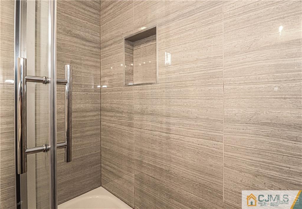 578 Chain O' Hills Road Colonia, NJ 07067 - Photo 29 of 39 a bathroom with a shower