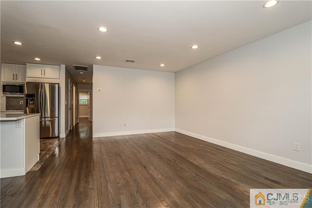 578 Chain O' Hills Road Colonia, NJ 07067 - Photo 8 of 39 a view of empty room with wooden floor