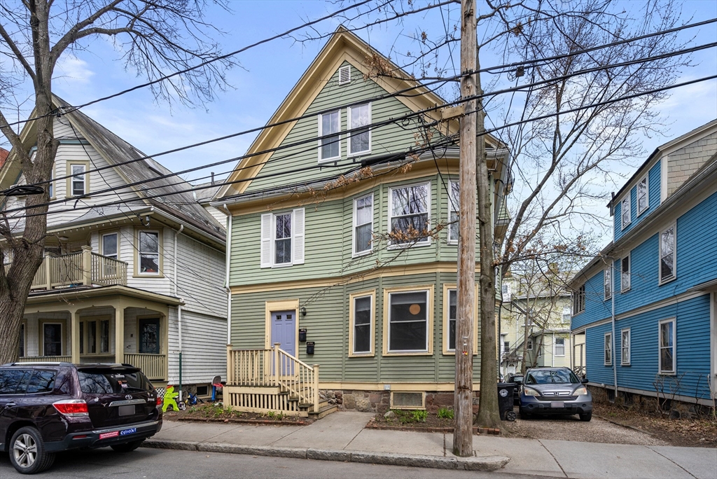 a car parked in front of a building