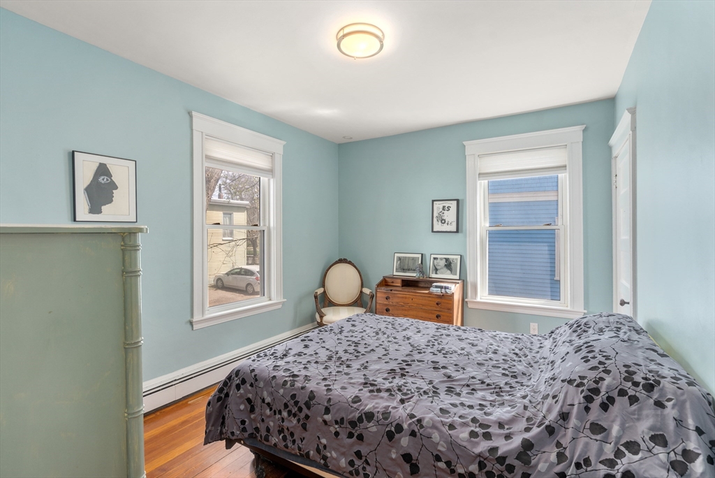 75 Brook Street, Unit 1 Brookline, MA 02445 - Photo 13 of 26 a bedroom with bed and a window