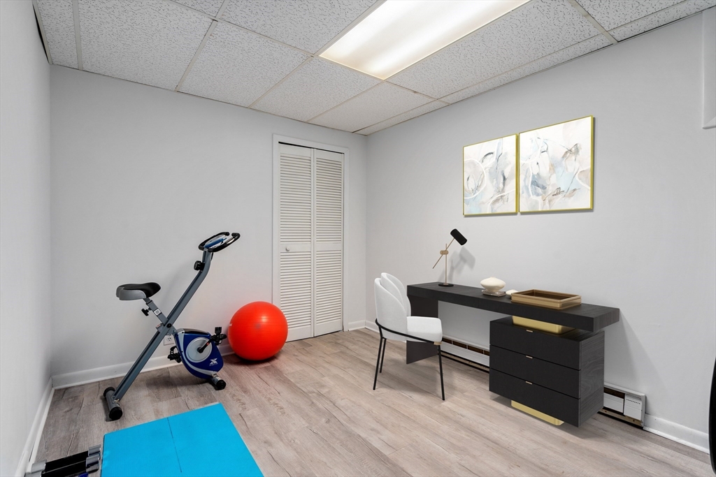 75 Brook Street, Unit 1 Brookline, MA 02445 - Photo 20 of 26 a room with furniture and air hockey table