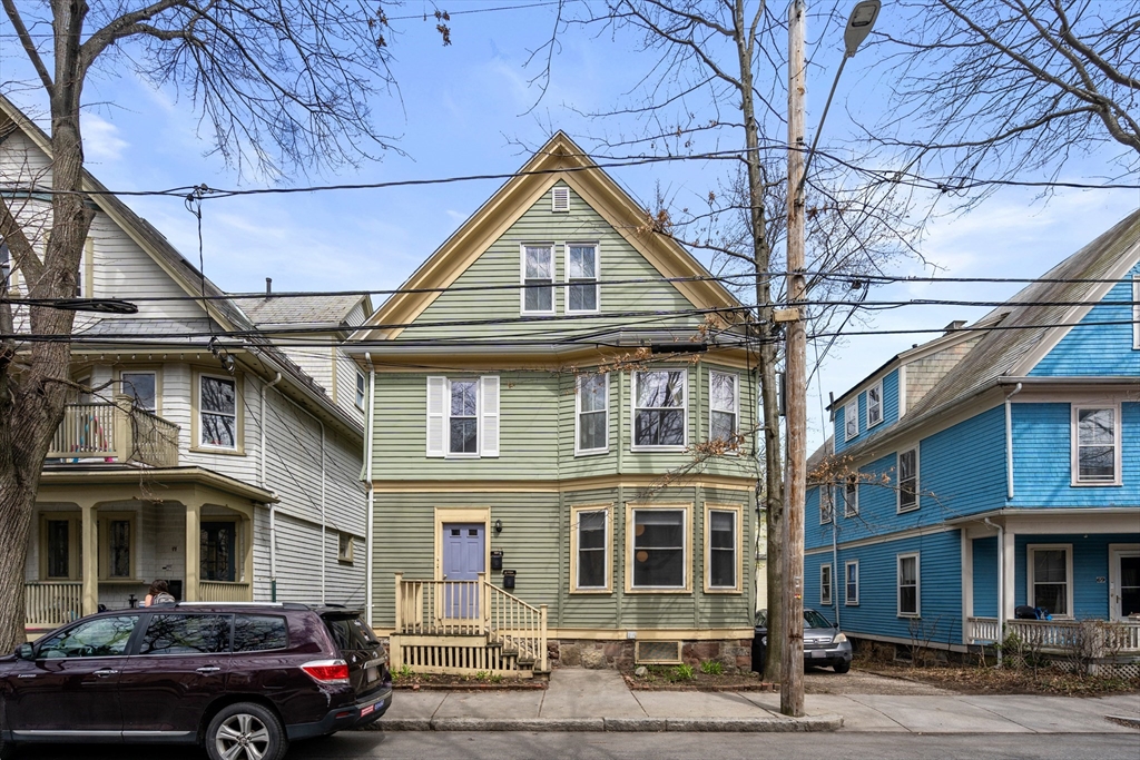75 Brook Street, Unit 1 Brookline, MA 02445 - Photo 2 of 26 a car parked in front of a building