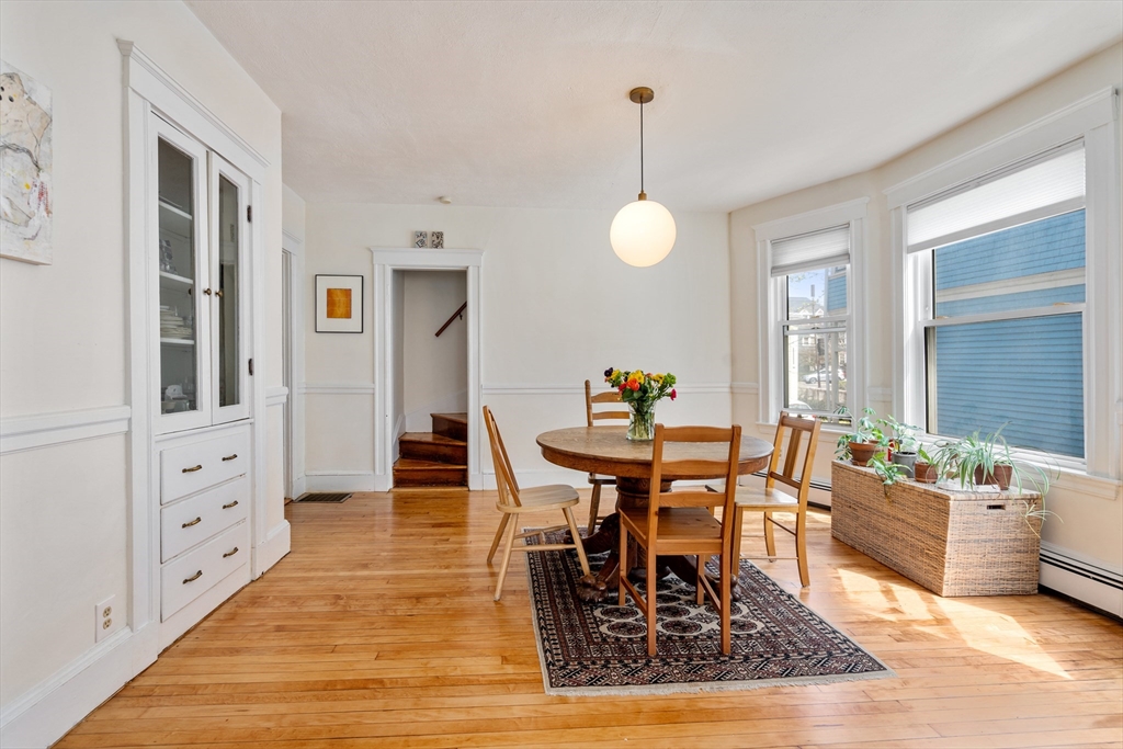 75 Brook Street, Unit 1 Brookline, MA 02445 - Photo 7 of 26 a view of a dining room and furniture