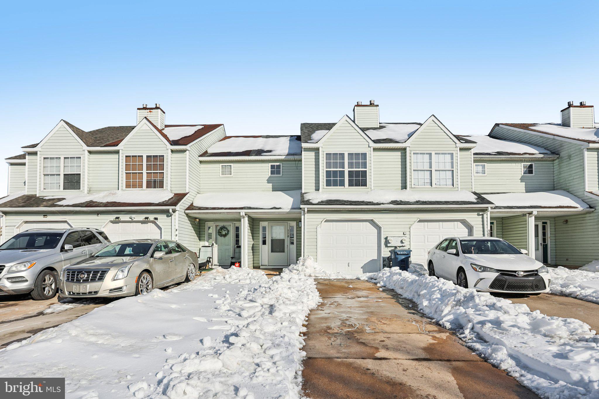 110 Auckland Drive Newark, DE 19702 - Photo 2 of 30 a front view of a house with cars parked
