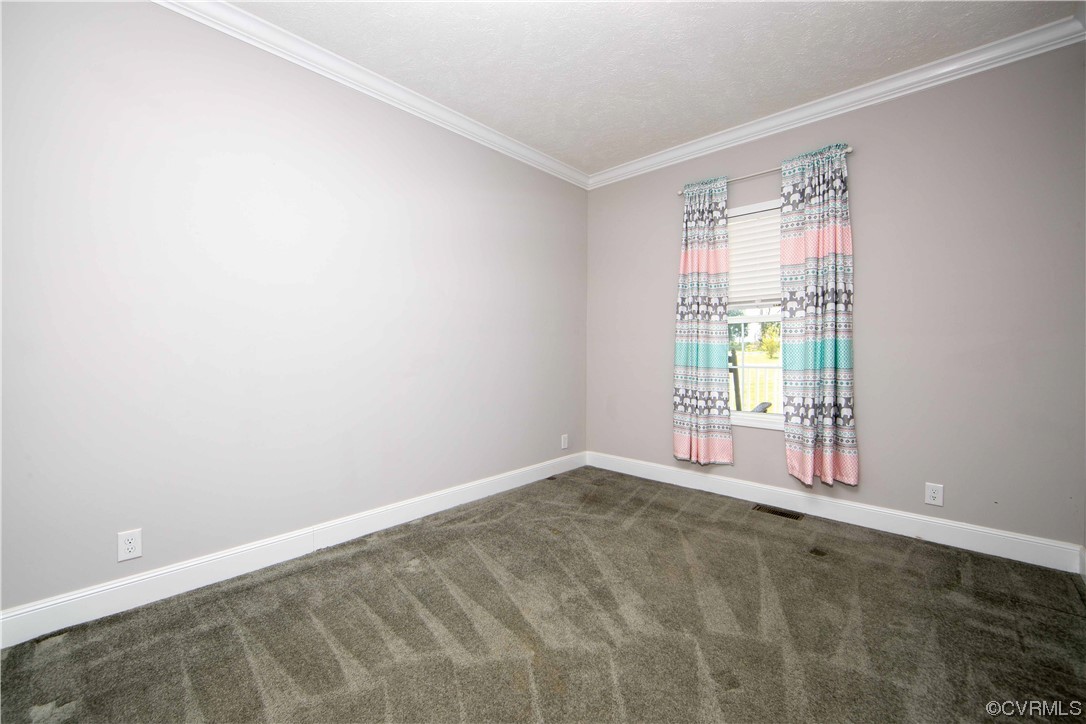 617 Mohawk Road Buckingham, VA 23921 - Photo 18 of 26 a view of an empty room with a window