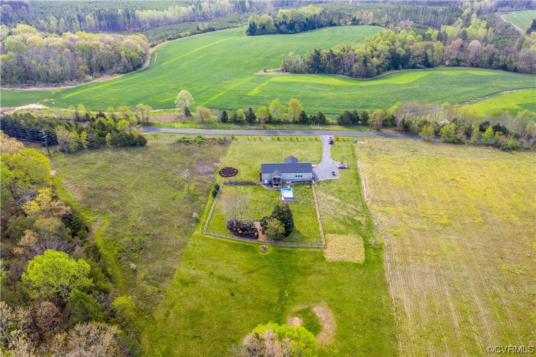 617 Mohawk Road Buckingham, VA 23921 - Photo 3 of 26 a view of a lake with a yard