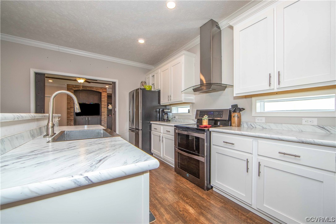 617 Mohawk Road Buckingham, VA 23921 - Photo 4 of 26 a kitchen with kitchen island granite countertop a stove and a sink