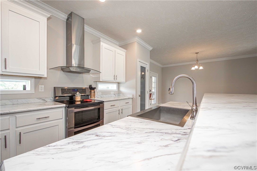 617 Mohawk Road Buckingham, VA 23921 - Photo 6 of 26 a kitchen with stainless steel appliances kitchen island granite countertop a stove a sink and a refrigerator