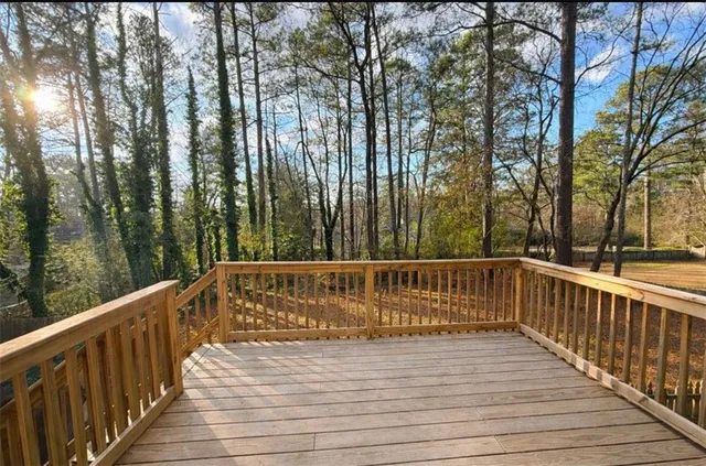 a view of deck with trees