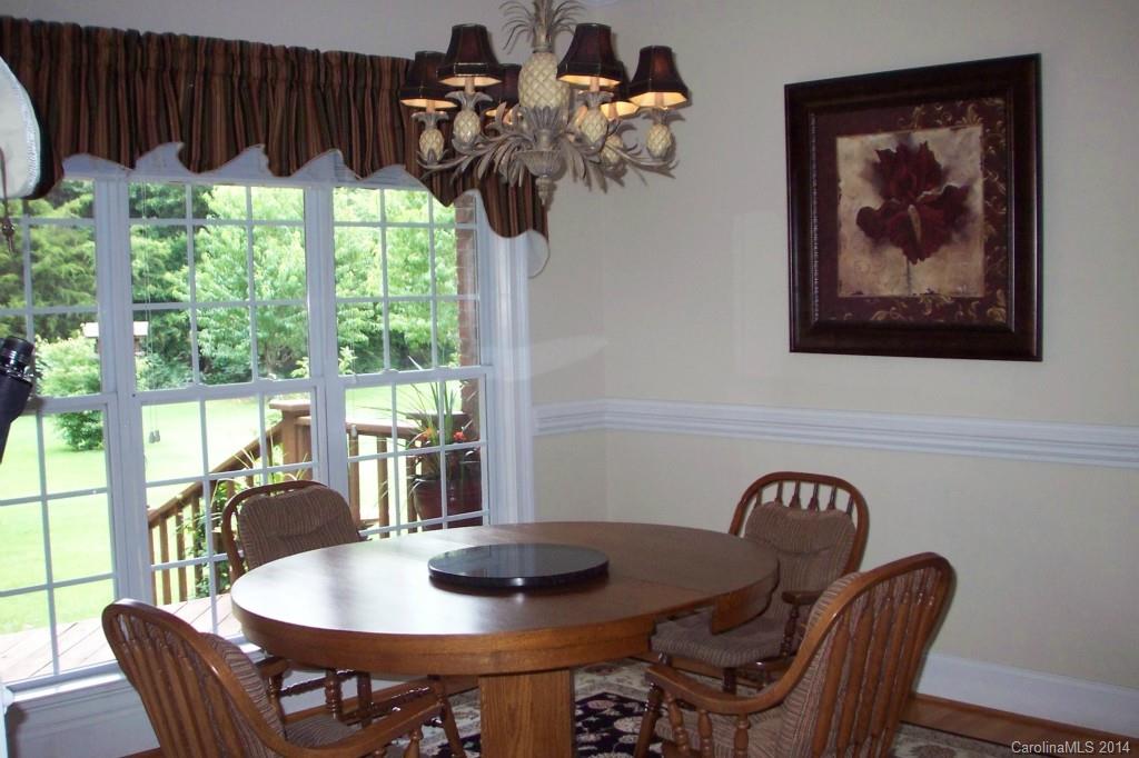 914 Haddonfield Drive, Unit 10 Fort Mill, SC 29708 - Photo 14 of 24 a view of a dining room with furniture window and outside view
