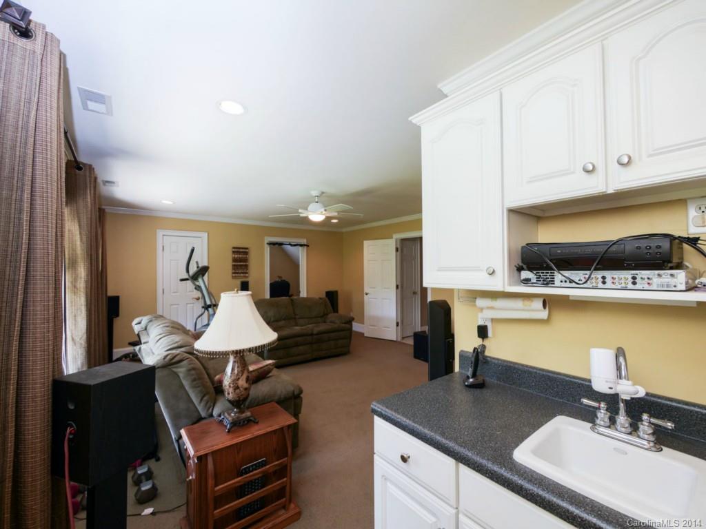 914 Haddonfield Drive, Unit 10 Fort Mill, SC 29708 - Photo 21 of 24 a living room with furniture and kitchen view