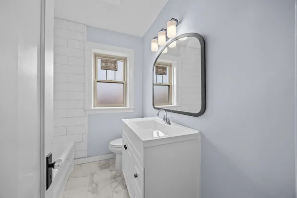 a bathroom with a bathtub