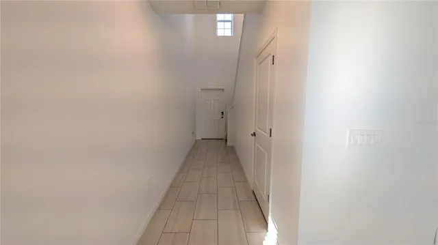 a bathroom with a sink toilet and a mirror