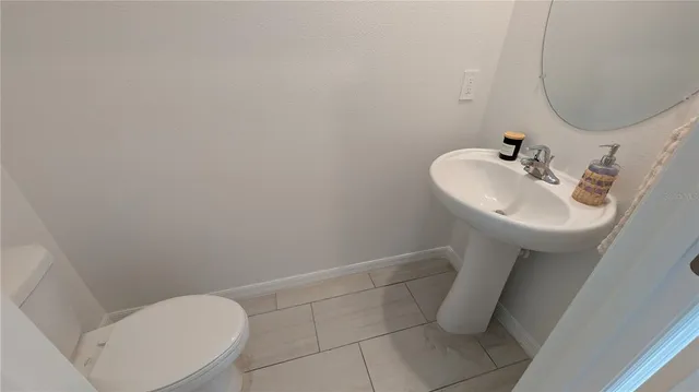 a view of a hallway with stairs