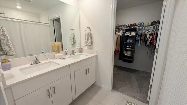 a bathroom with a toilet and a sink