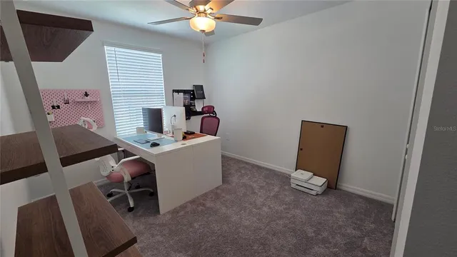 a view of entryway with livingroom