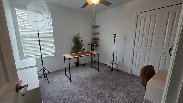 a view of a workspace with furniture