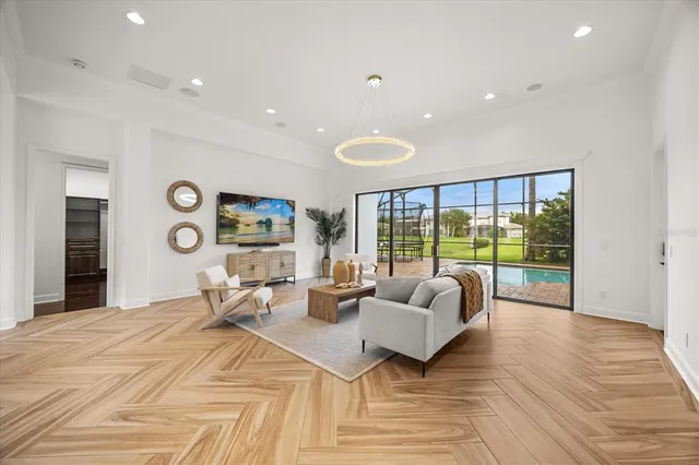 a kitchen with kitchen island granite countertop a sink and a stove