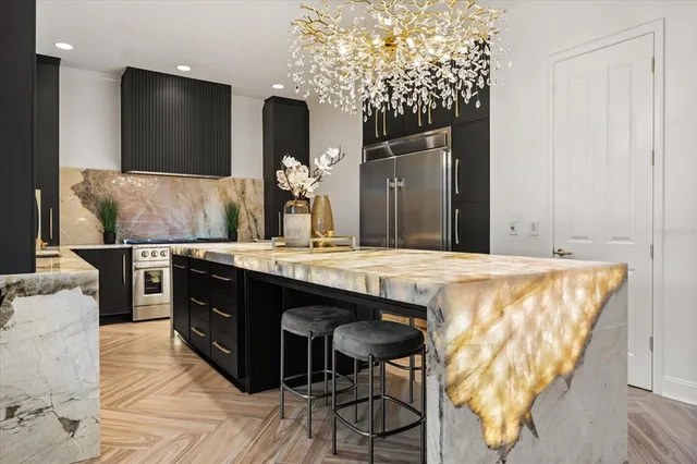 a living room with furniture a rug and white walls