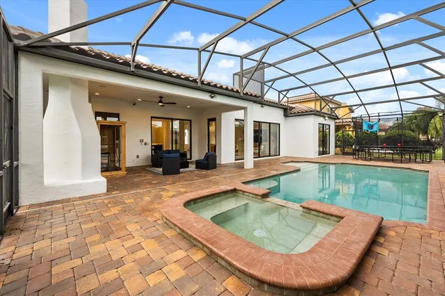 $1,299,900 | 7733 Pointe Venezia Drive, Orlando, FL 32836