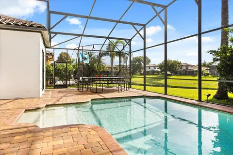 $1,299,900 | 7733 Pointe Venezia Drive, Orlando, FL 32836