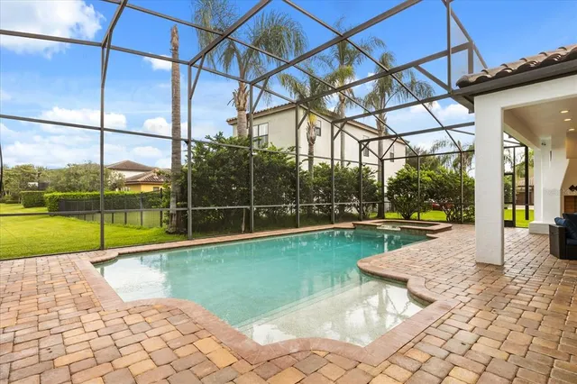 $1,299,900 | 7733 Pointe Venezia Drive, Orlando, FL 32836