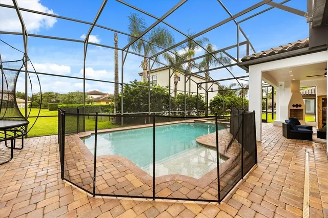 $1,299,900 | 7733 Pointe Venezia Drive, Orlando, FL 32836