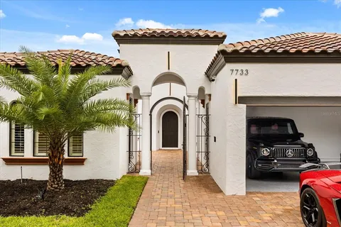 $1,299,900 | 7733 Pointe Venezia Drive, Orlando, FL 32836