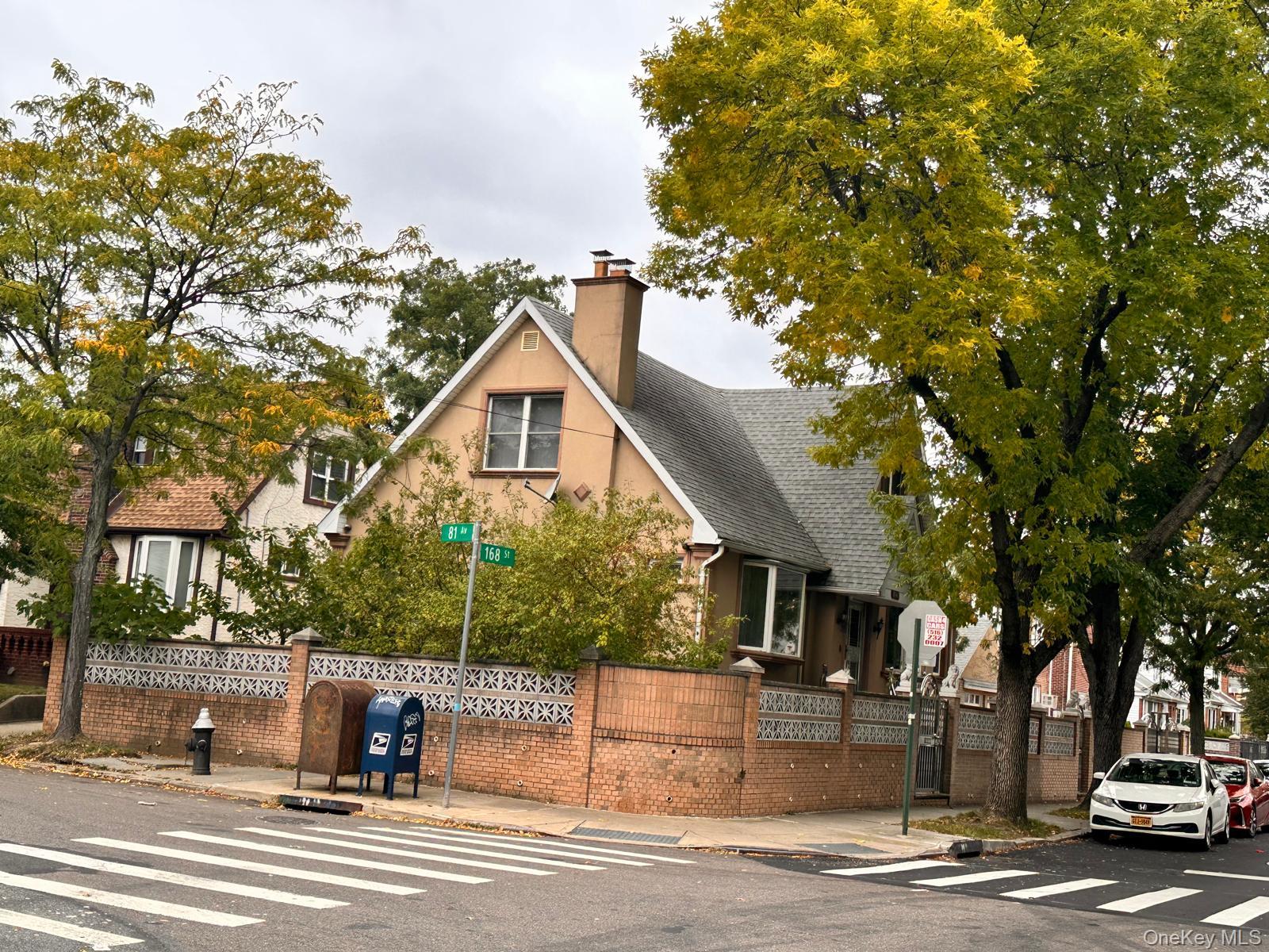 a view of a house with a street