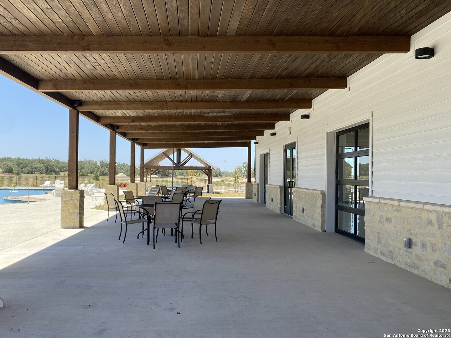 930 Maximino Ridge Rd. Bulverde, TX 78163 - Photo 12 of 18 a dining room with furniture and a table