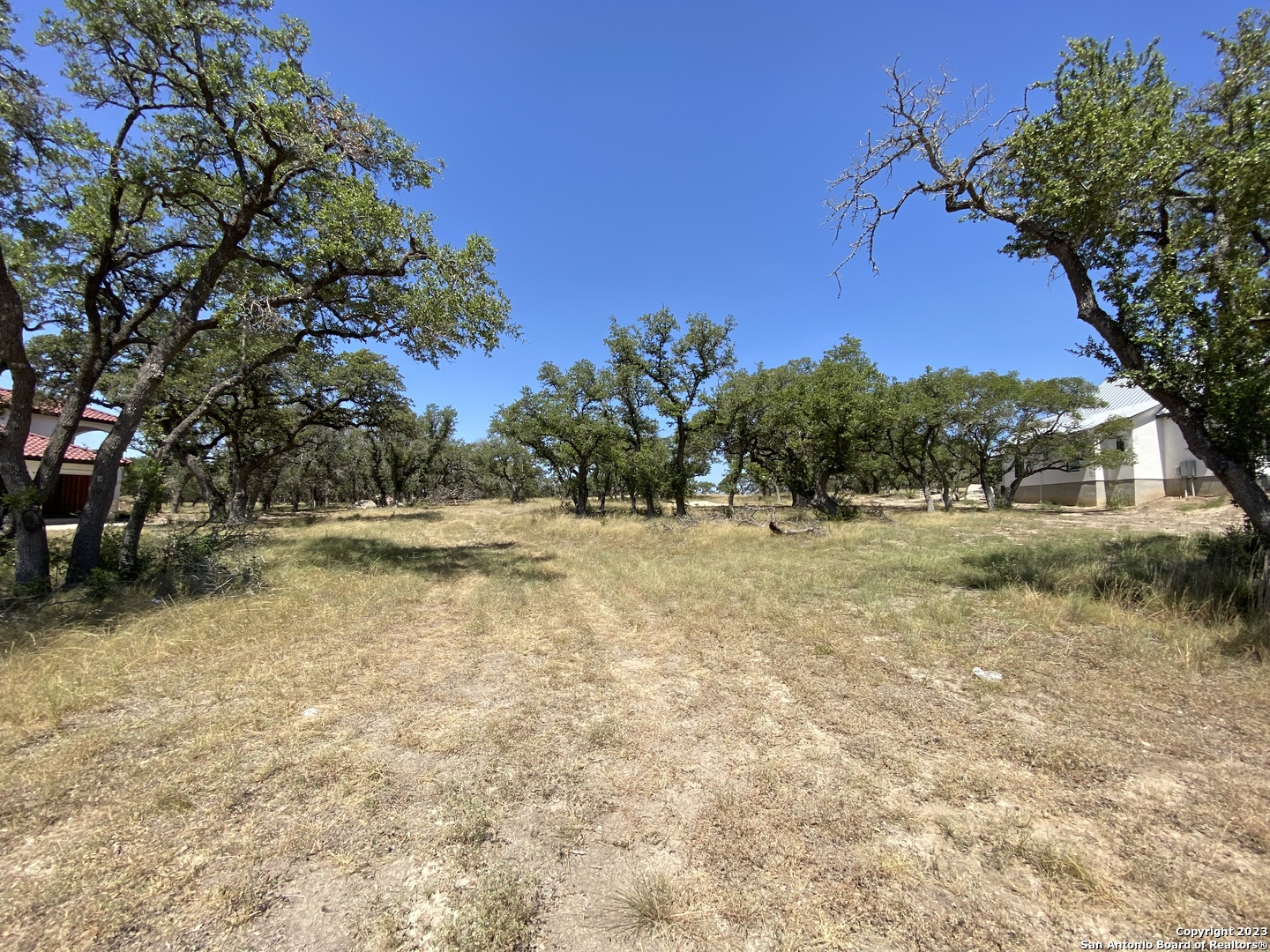 930 Maximino Ridge Rd. Bulverde, TX 78163 - Photo 4 of 18 a view of swimming pool with an outdoor space