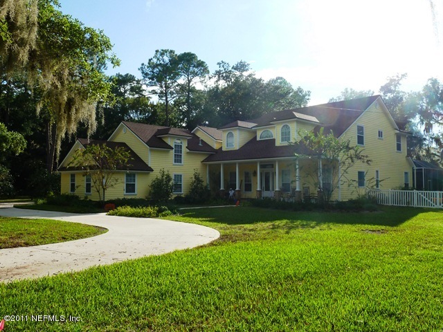 472 Fruit Cove Road St. Johns, FL 32259 - Photo 11 of 12 HOME NEXT DOOR TO LEFT