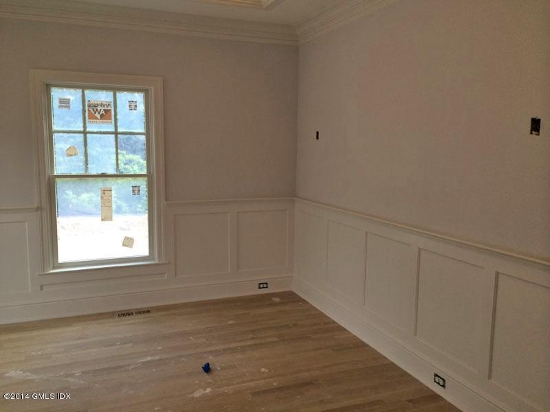 4 Gregory Road Cos Cob, CT 06807 - Photo 5 of 15 an empty room with a window