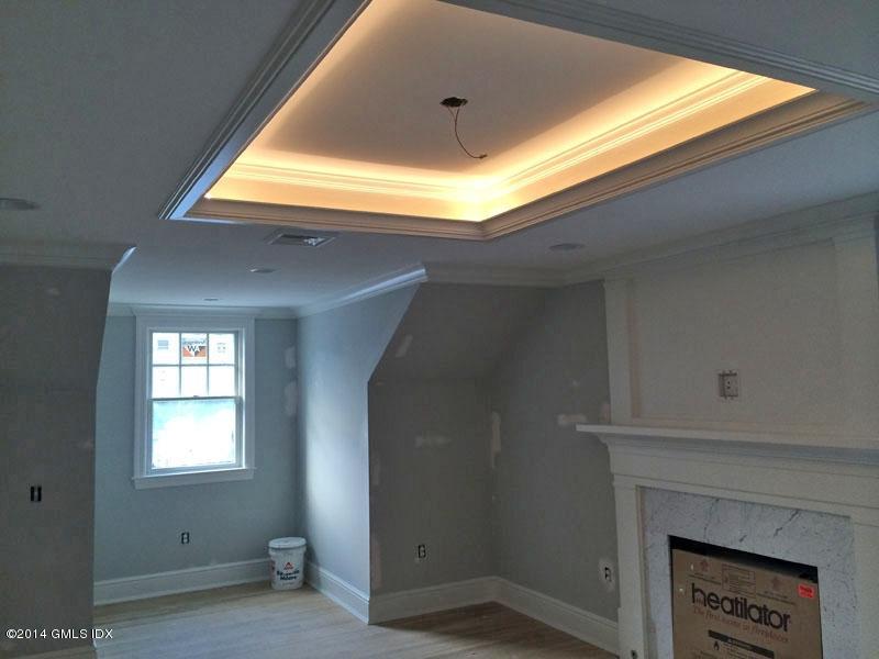 4 Gregory Road Cos Cob, CT 06807 - Photo 10 of 15 a view of livingroom with fireplace and window