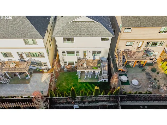 an aerial view of a house with swimming pool