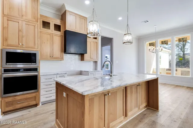 $495,000 | 107 Cypress Lk Drive, Youngsville, LA 70592