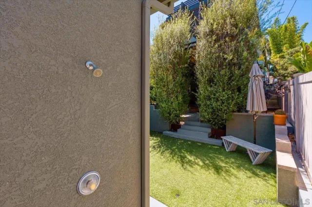 a view of swimming pool from a balcony