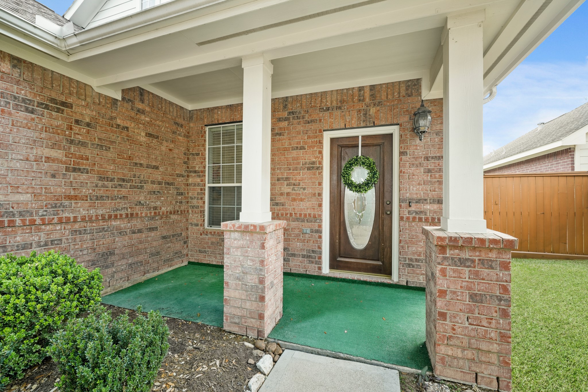 25003 Spring Ash Lane Katy, TX 77494 - Photo 1 of 43 This charming brick home welcomes you with beautifully landscaped walkways leading to a covered front porch framed by elegant decorative columns and an artificial turfed floor.