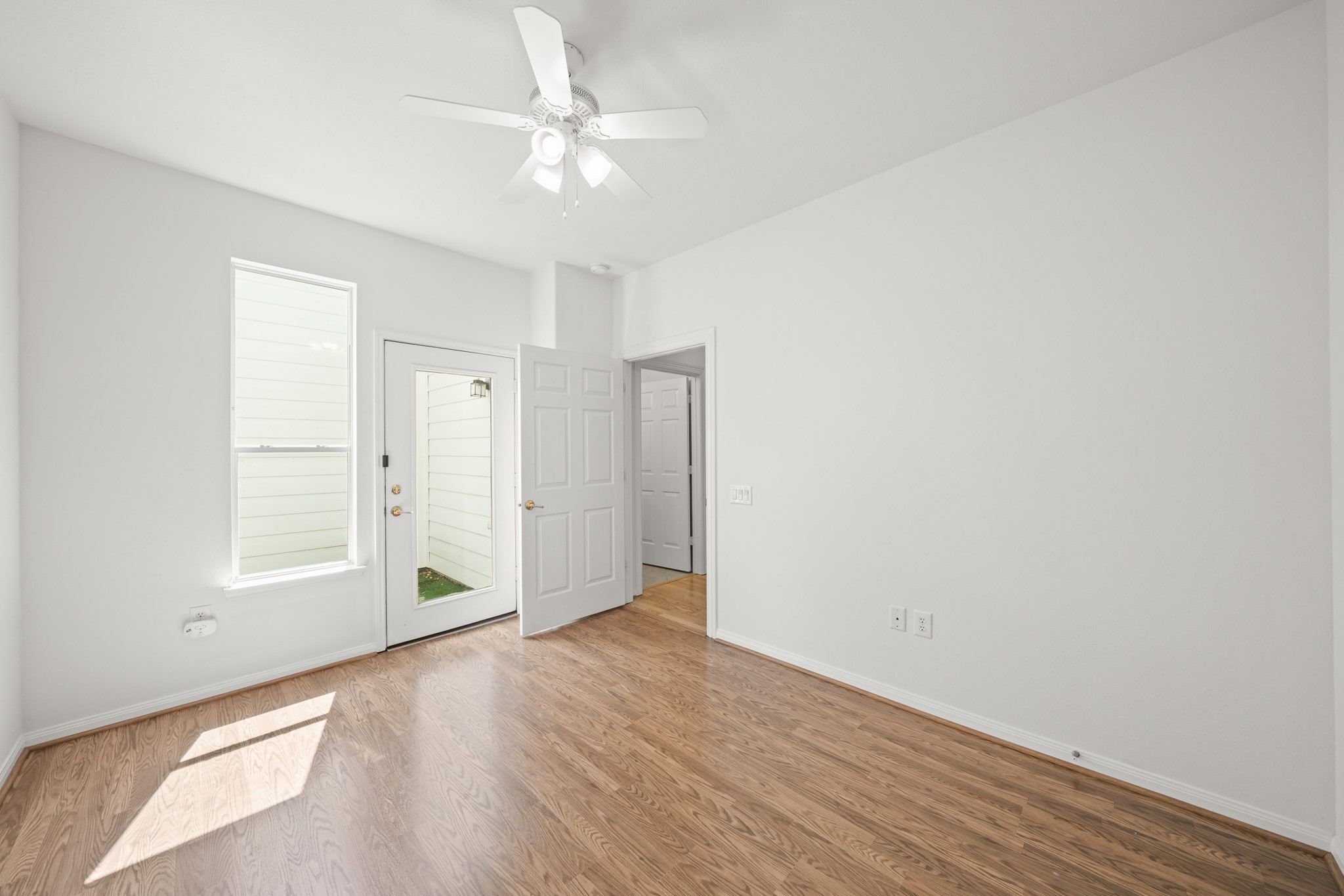 25003 Spring Ash Lane Katy, TX 77494 - Photo 28 of 43 This secondary bedroom features a glass door that opens up to your own private patio!