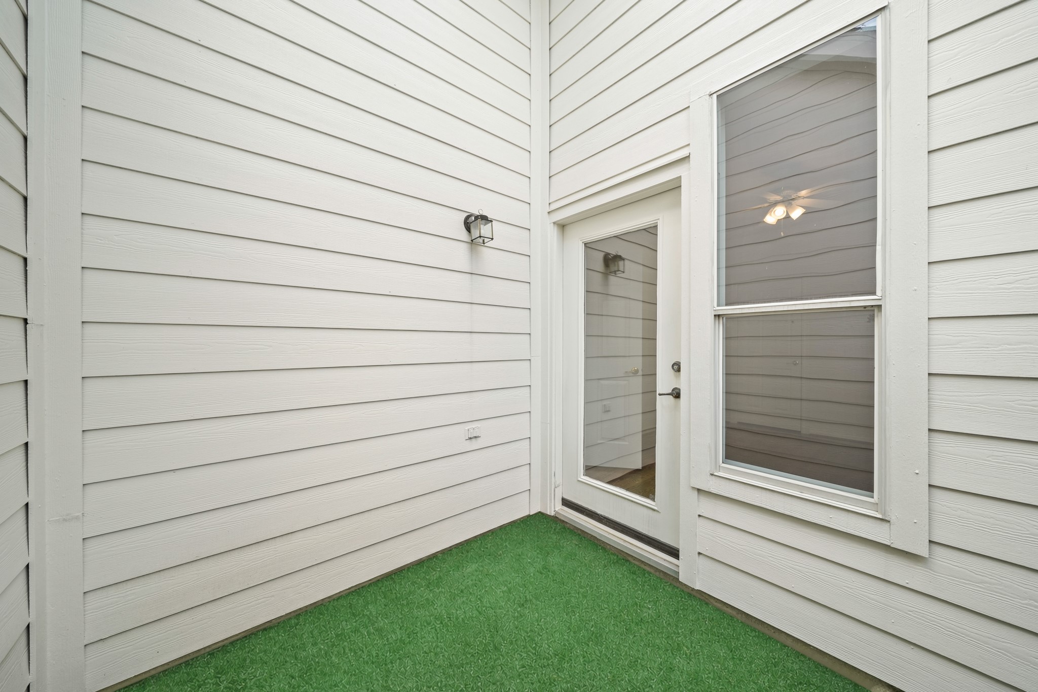 25003 Spring Ash Lane Katy, TX 77494 - Photo 30 of 43 The potential of your own private retreat off the secondary bedroom is perfect for crafting a serene small garden or cozy sitting nook.