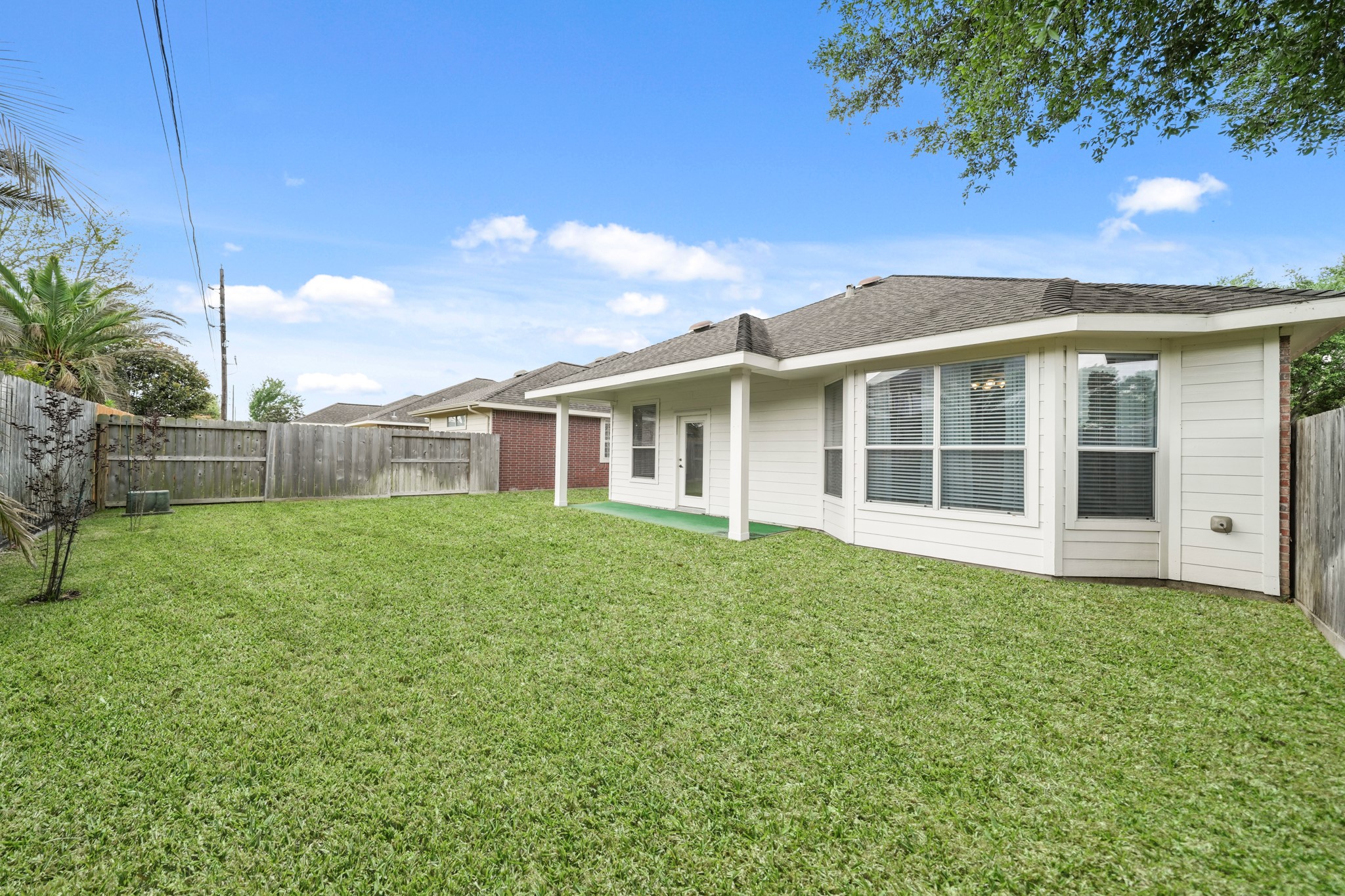 25003 Spring Ash Lane Katy, TX 77494 - Photo 37 of 43 This spacious backyard is brimming with potential, perfect for crafting your dream garden or creating a custom entertainment oasis.