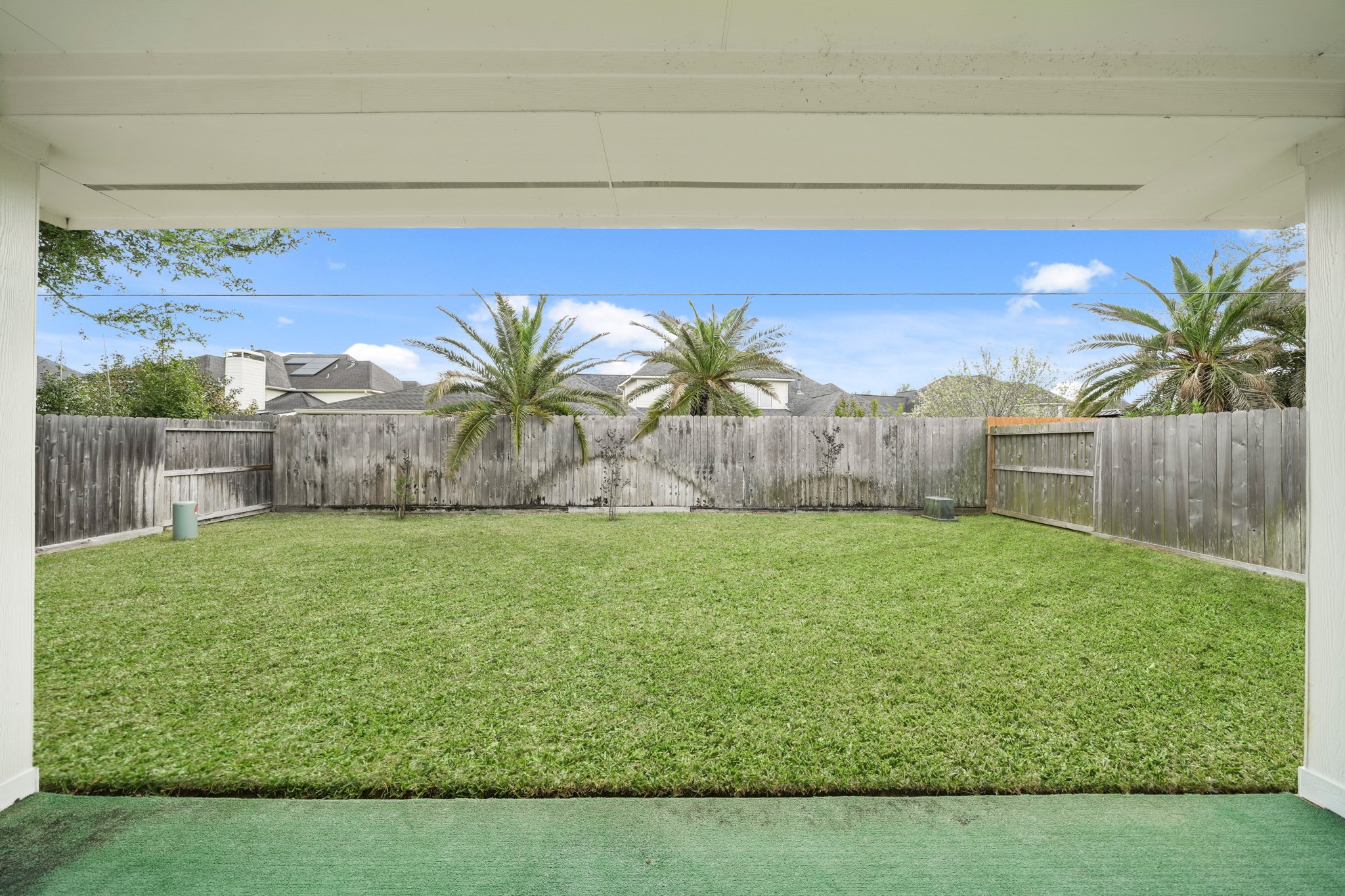 25003 Spring Ash Lane Katy, TX 77494 - Photo 40 of 43 You will love the pristine, inviting outdoor oasis with a beautifully maintained lawn, perfect for relaxation and enjoyment.