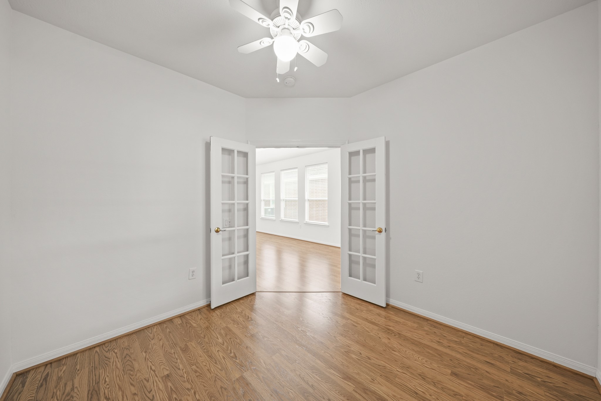 25003 Spring Ash Lane Katy, TX 77494 - Photo 5 of 43 The private study with elegant French doors and ample natural light, is the perfect sanctuary for remote work, focused study or creative inspiration.